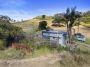 Big acreage close to the coast with outstanding views!